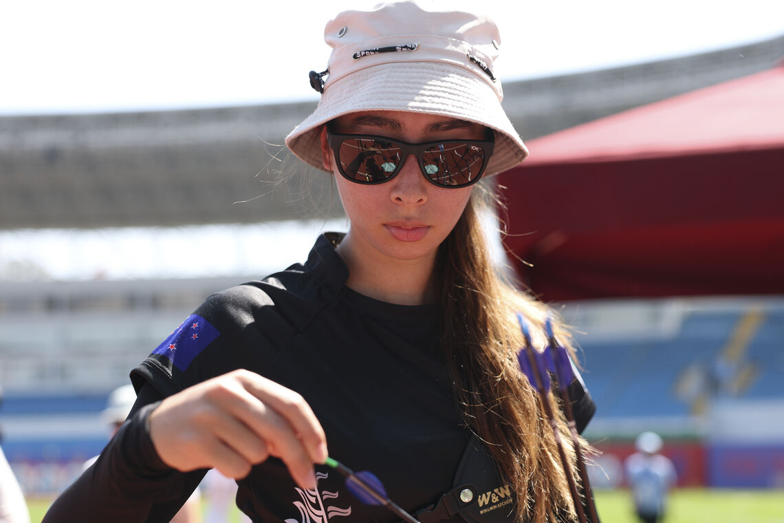 Julia Harrison checking her arrows during official practise of Shanghai 2026.