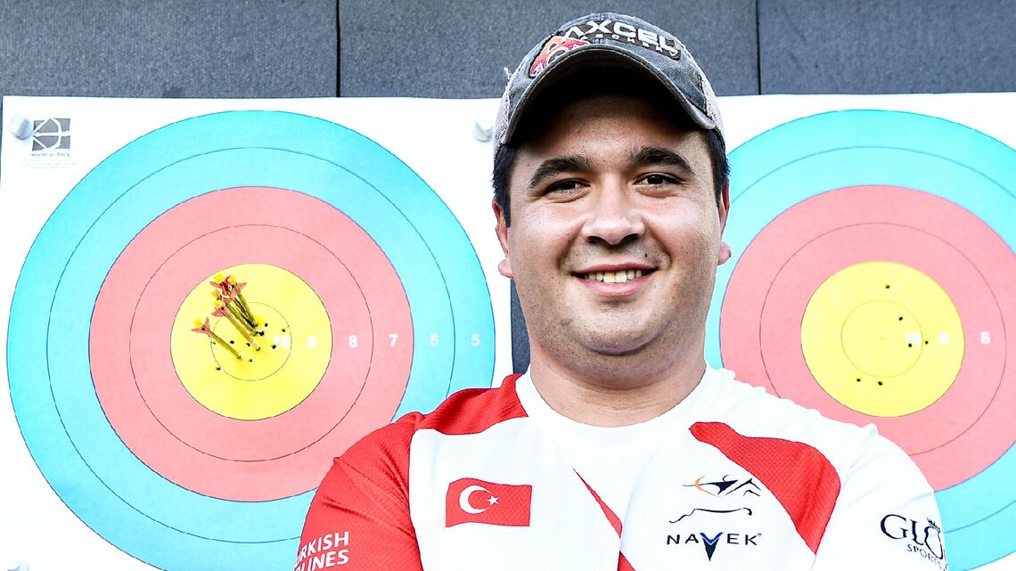 Emircan Haney posing next to his final end of six Xs.