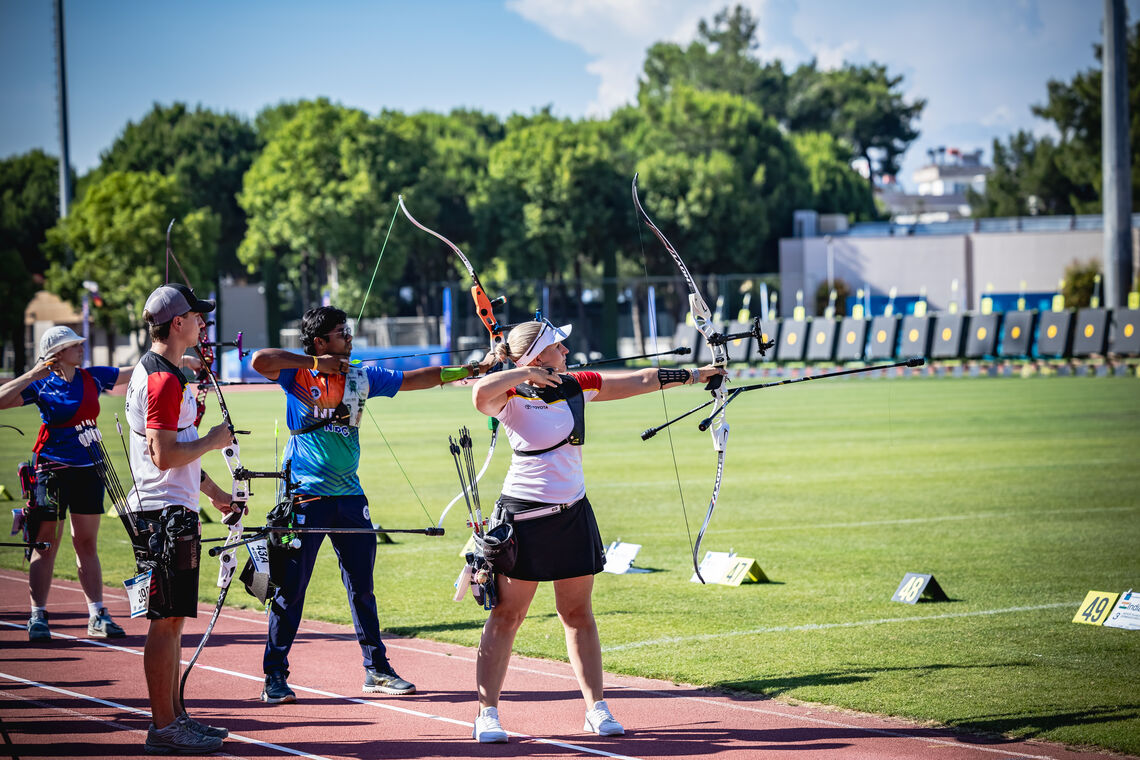 Dhiraj Bommadevara of India and Katharina Bauer of Germany aiming alongside each other at Antalya 2026.