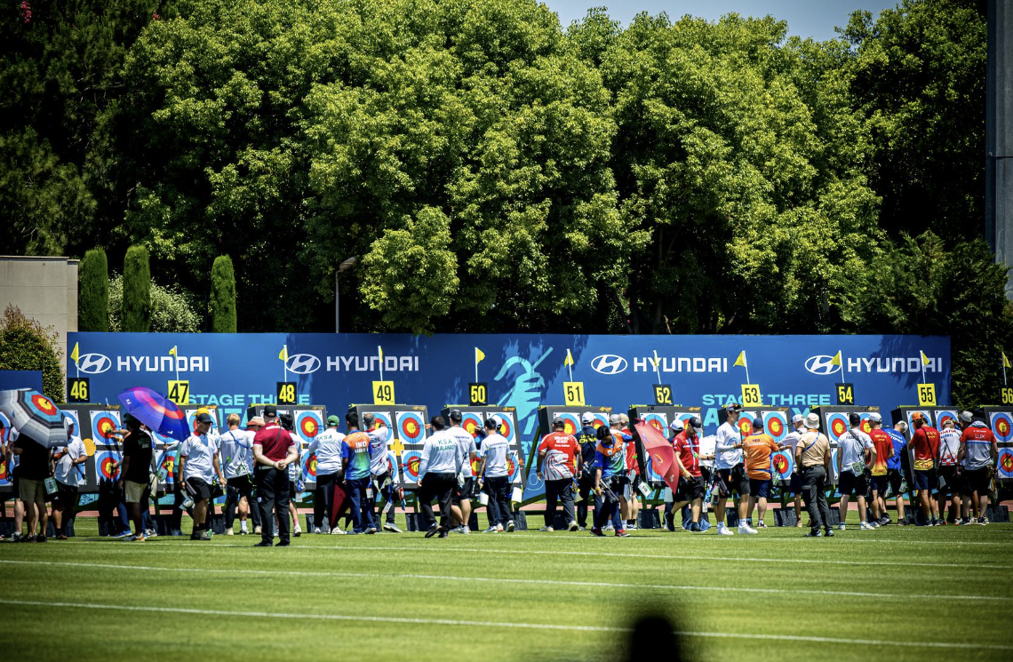 Compound archers counting their scores at the targets at Antalya 2026.