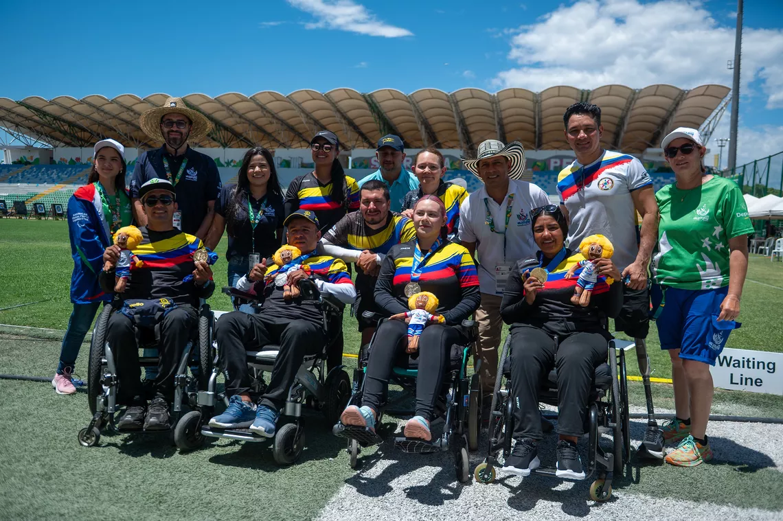 Archers pose with medals
