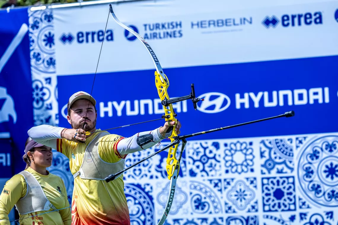 Andres Temino Mediel aiming in the recurve mixed team gold medal match at Madrid 2026.