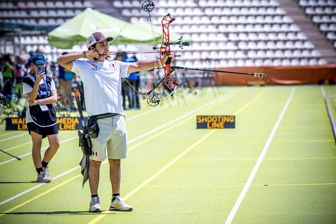 Rodrigo Olvera aiming on the shooting line at Madrid 2026.