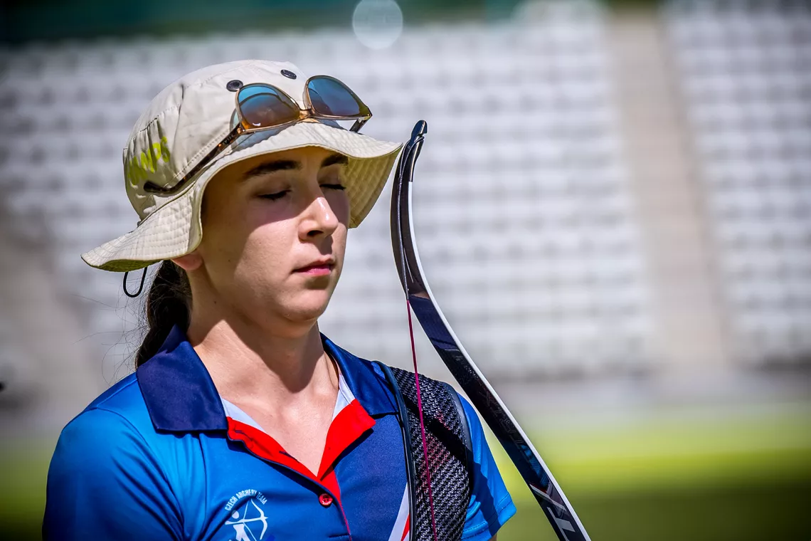 Marie Horackova eyes closed as she prepares to take a shot at Madrid 2026.