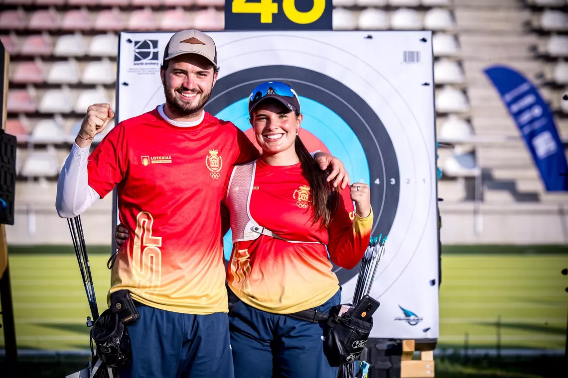 Andres Temino Mediel and Elia Canales smiling at the target together at Madrid 2026.