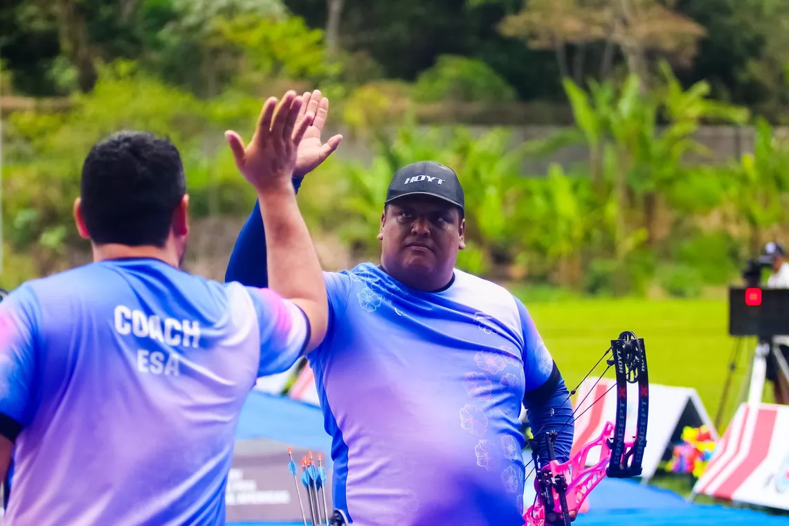 An athlete with his coach