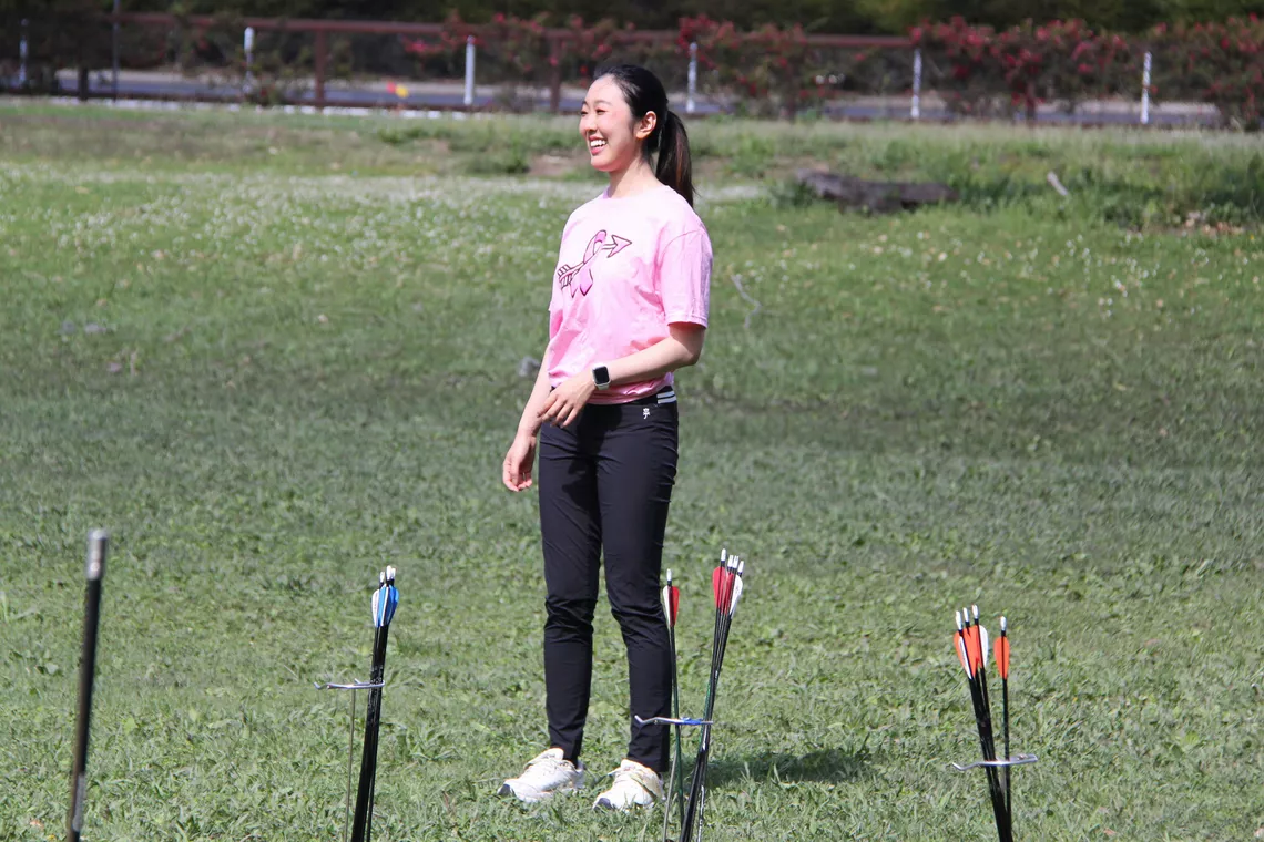Katherine Wu smiling during a session of Archery RX.