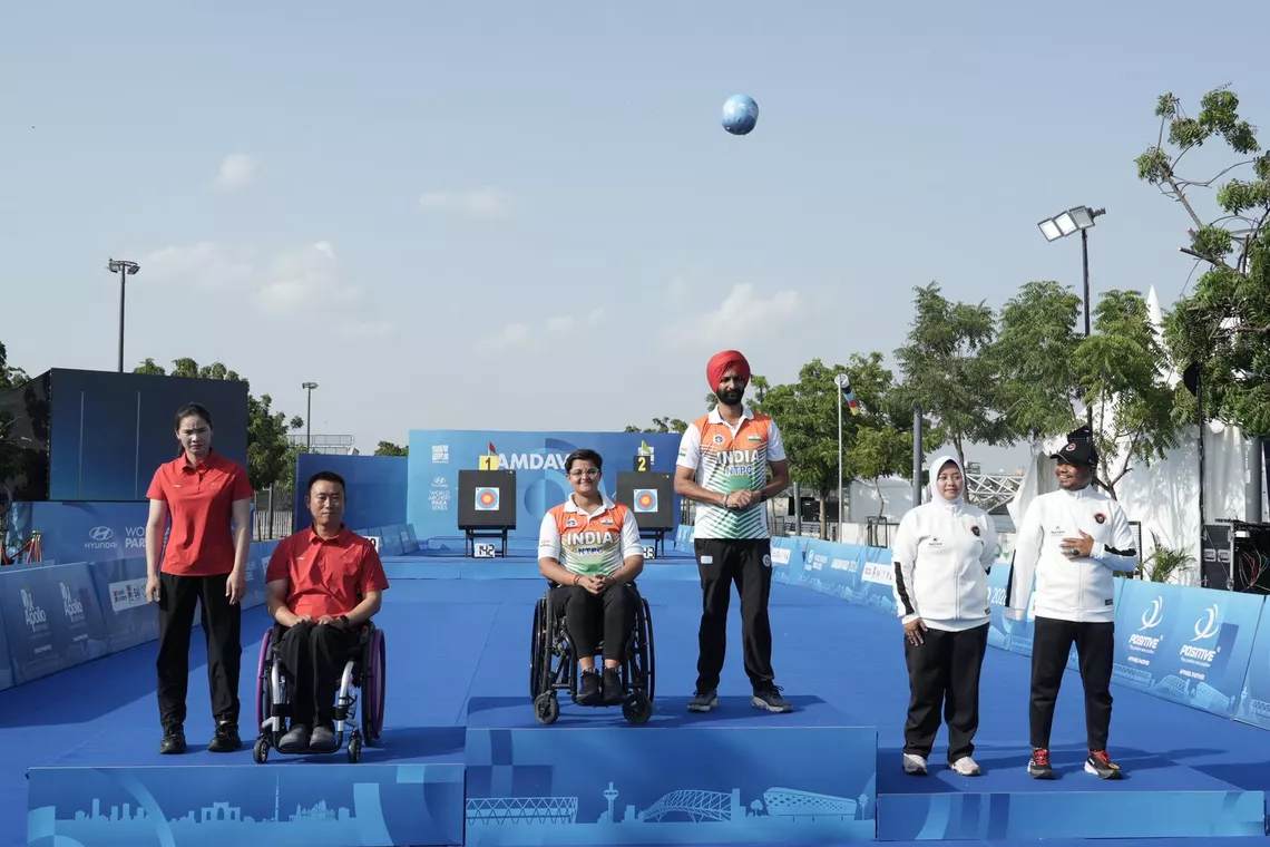 Athletes celebrate on podium