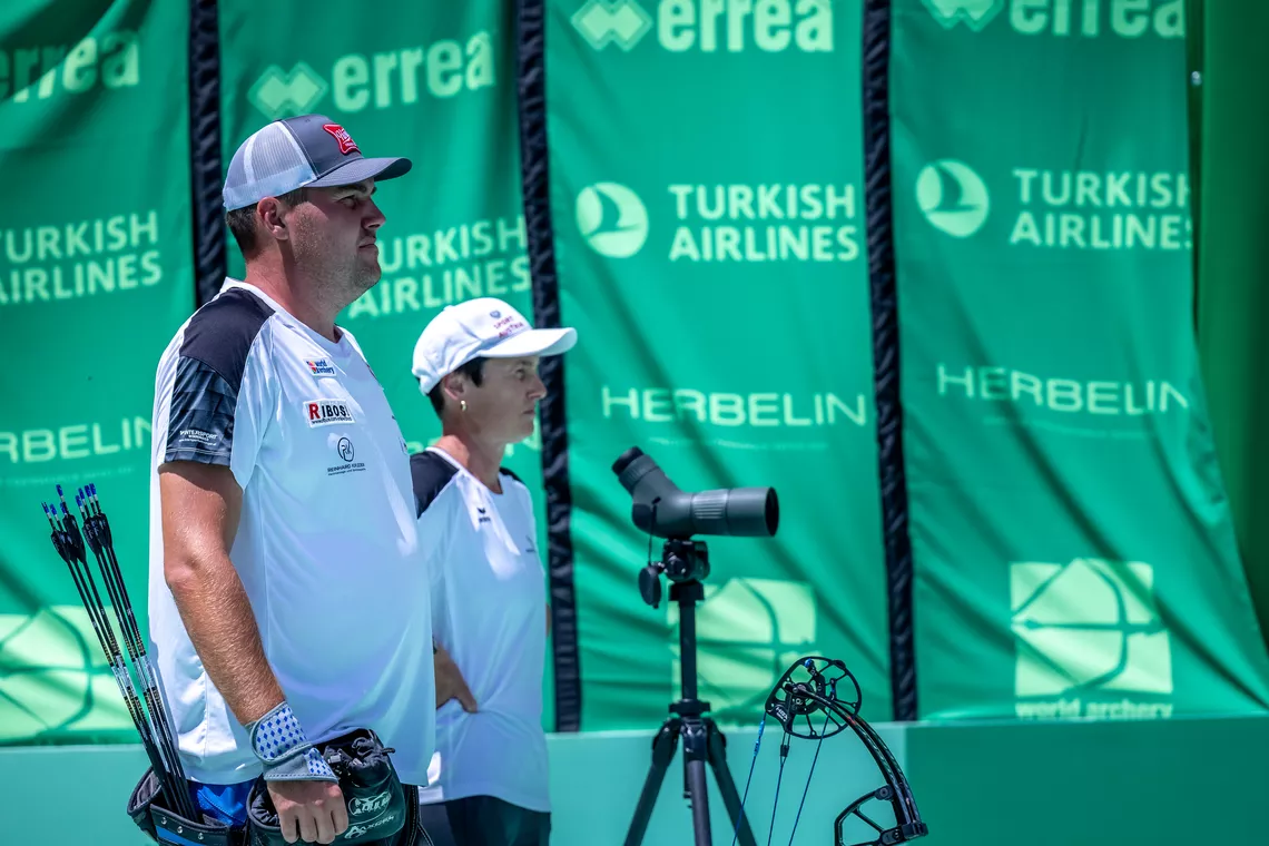 Nico and Bettina Wiener looking on at the target during a match at Saltillo 2026. 
