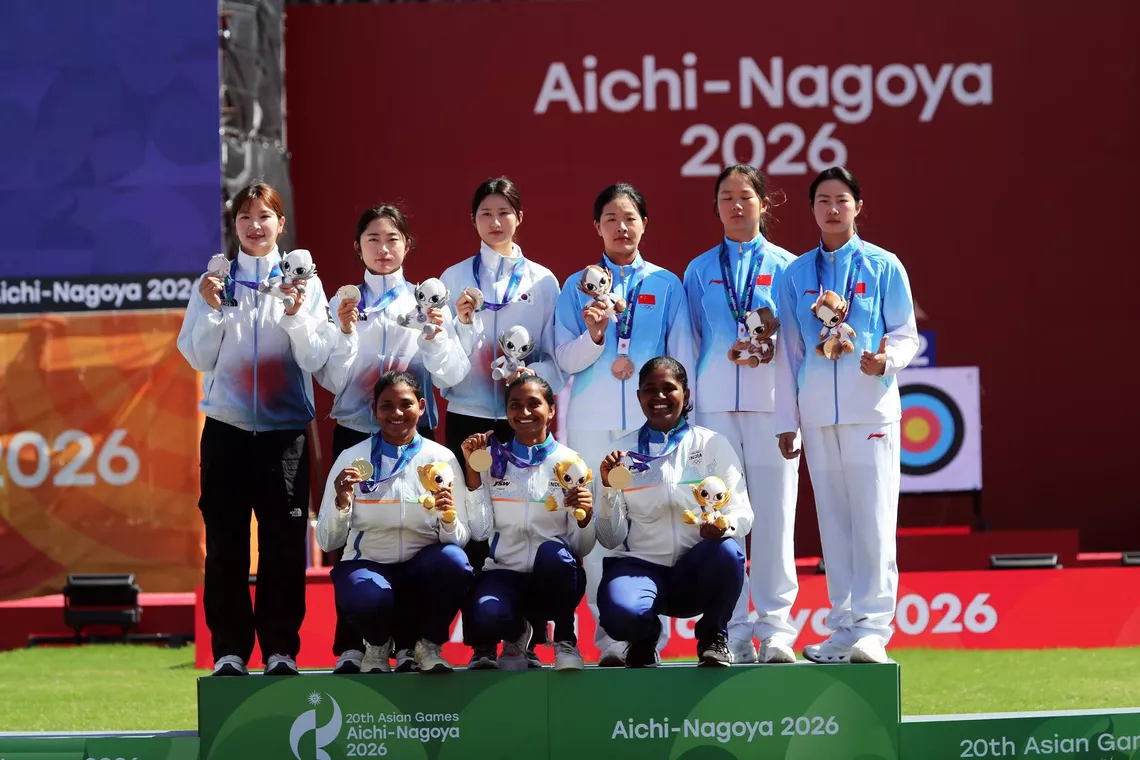 Athletes celebrate on podium