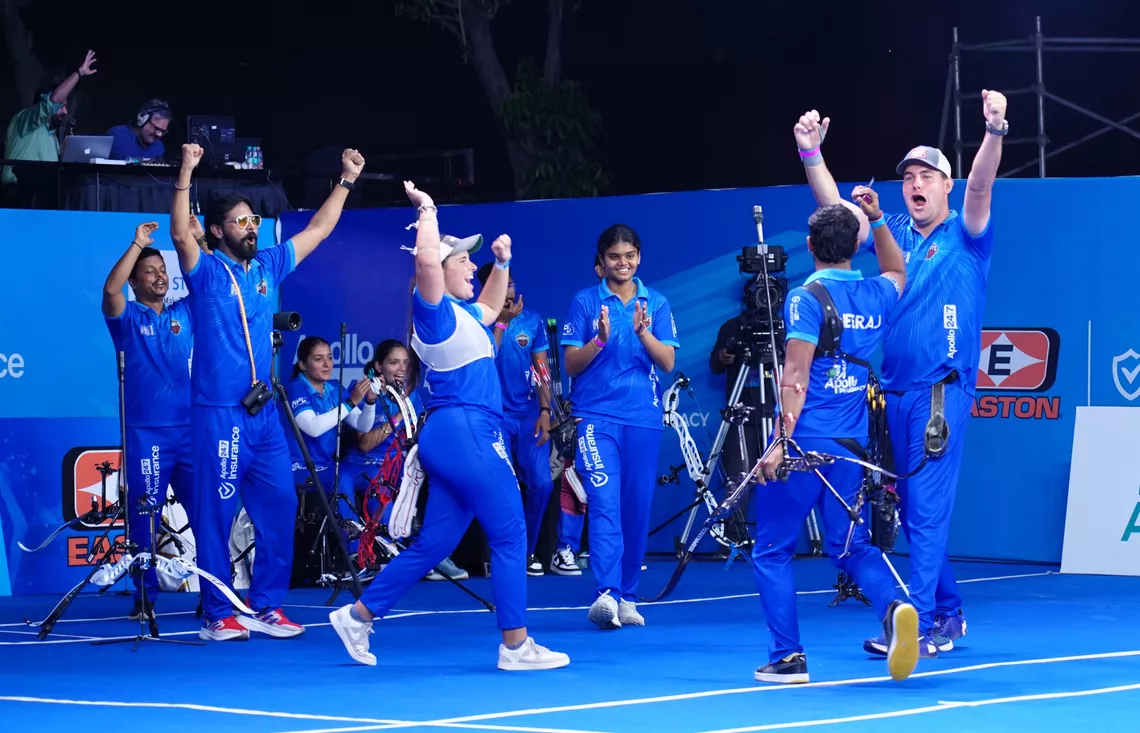 Athletes celebrate after a winning shot