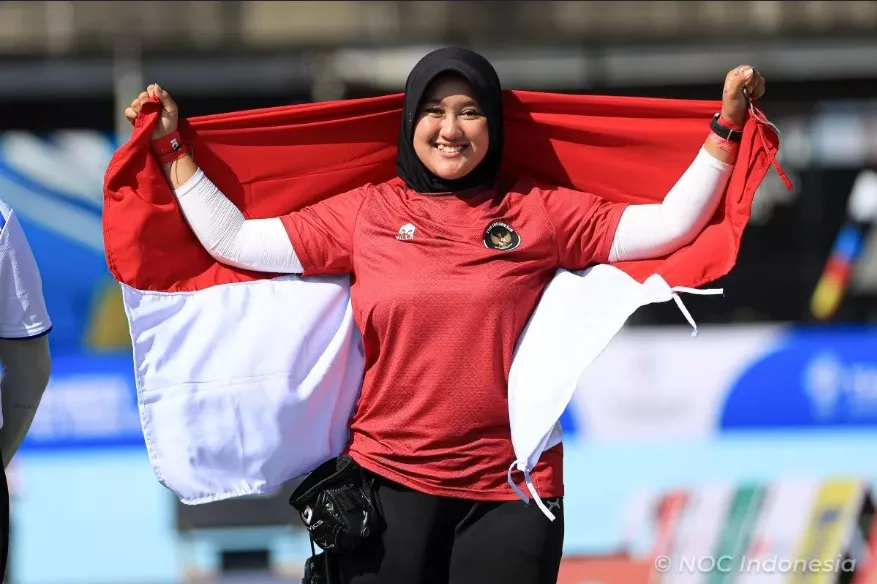 Athletes celebrate on podium