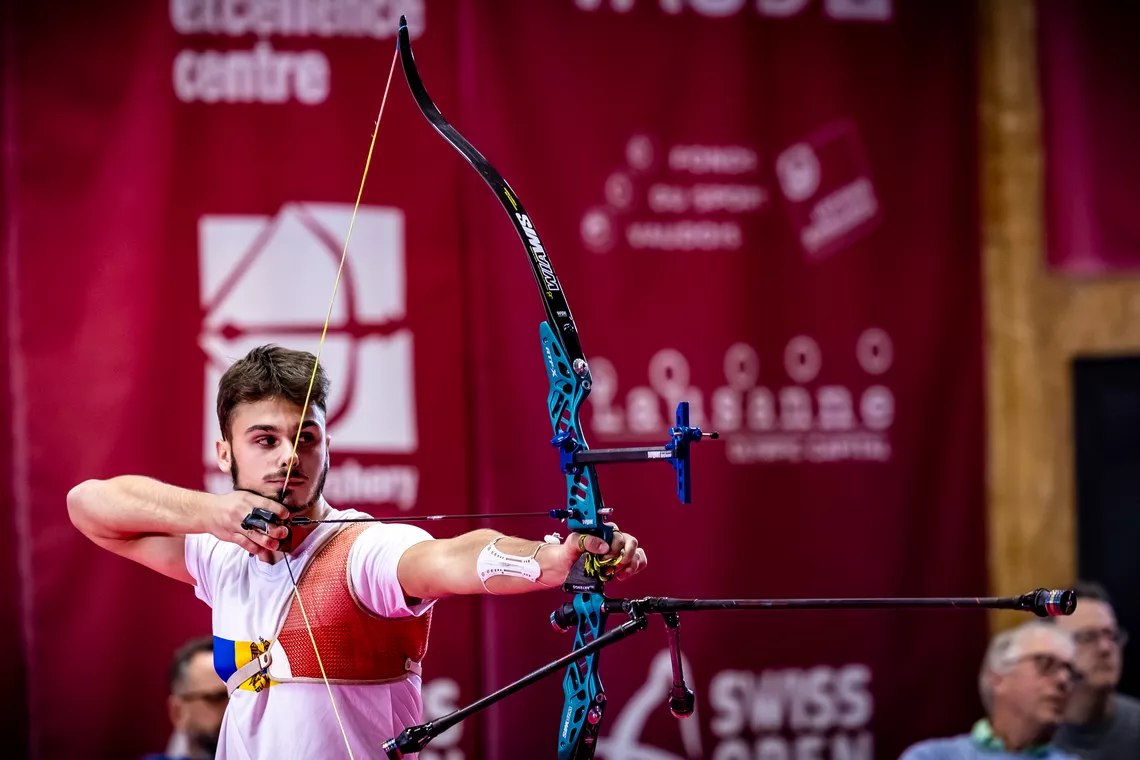 Recurve archer drawing at the 2025 Swiss Open. 