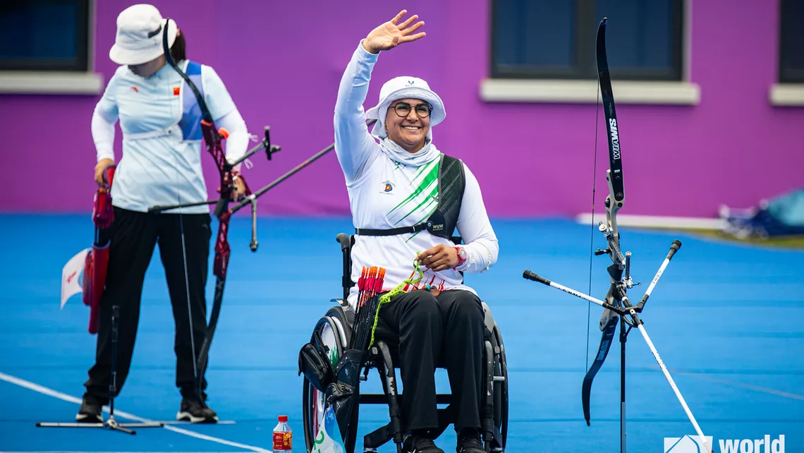 Zahra Nemati waving
