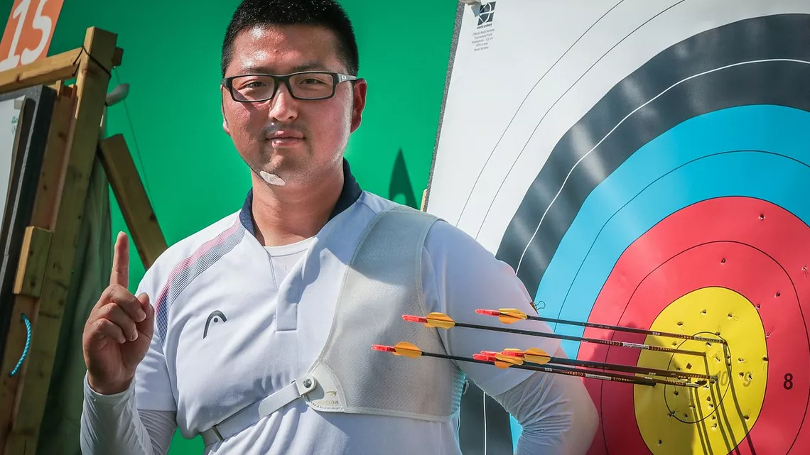 Kim Woojin celebrates securing the top seed at the Olympic Games in 2016.