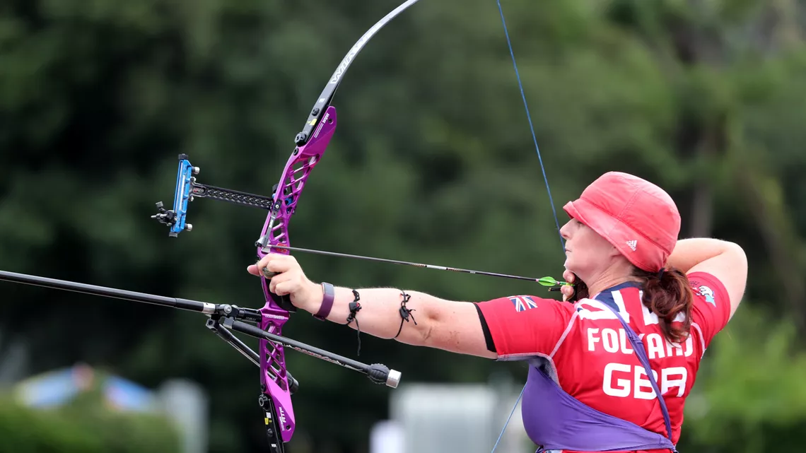 Naomi Folkard shoots at the test event for the Tokyo 2002 Olympic Games.