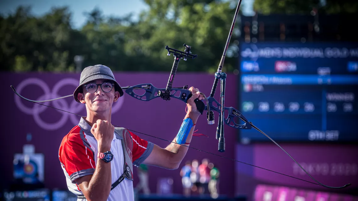 Mete Gazoz celebrates winning gold at the Tokyo 2020 Olympic Games. 