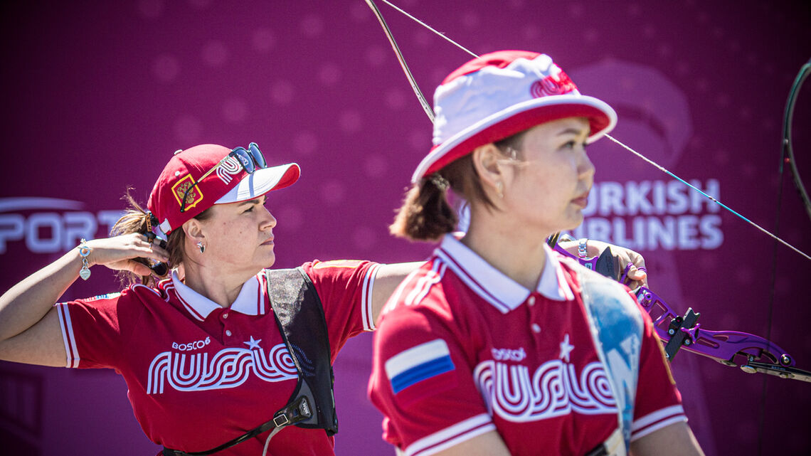 Ksenia Perova and Svetlana Gomboeva shoot in the final four of the second stage of the 2021 Hyundai Archery World Cup in Lausanne.