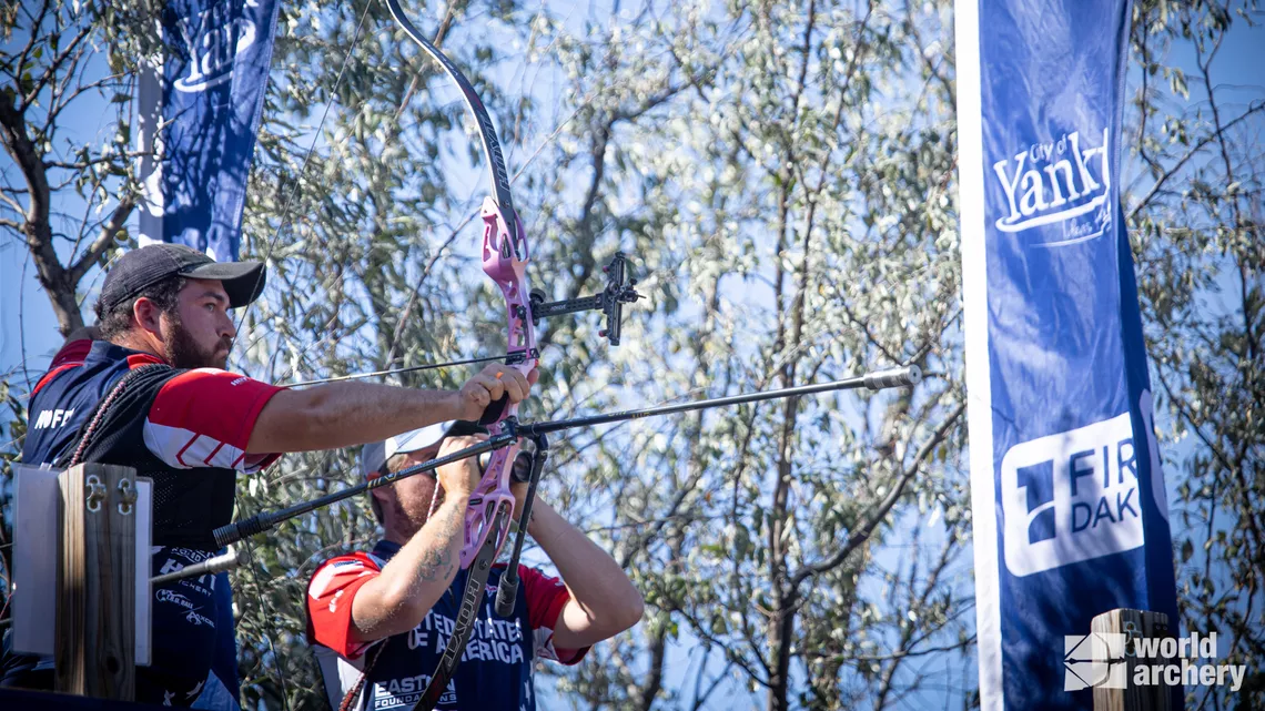 Matt Nofel coached by Brady Ellison during the world field championships.