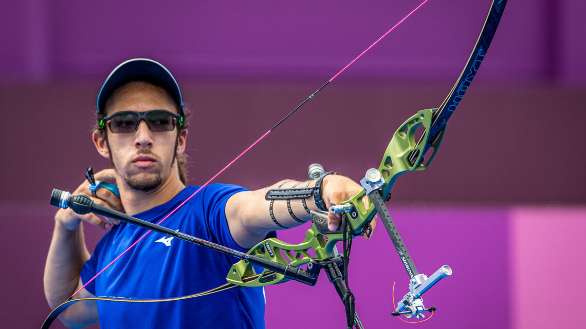 Itay Shanny shoots at the Tokyo 2020 Olympic Games.