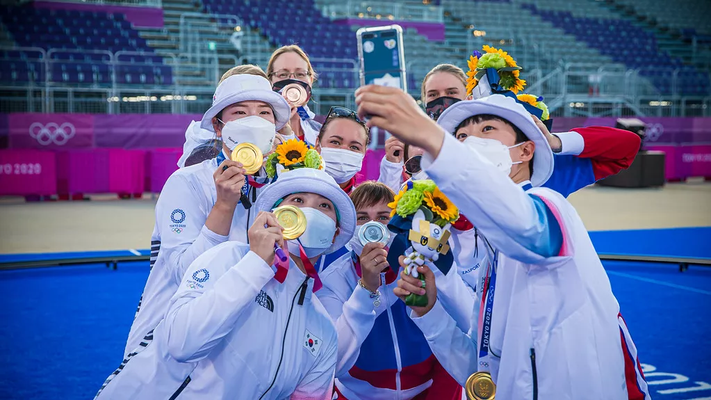 The women's teams celebrate their medals at the Tokyo 2020 Olympic Games. 