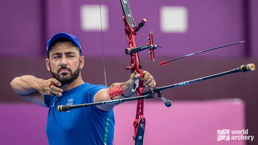 Mauro Nespoli shoots at the Tokyo 2020 Olympic Games. 