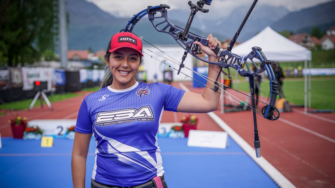 El Salvador's Paola Corado celebrates winning compound gold at the Veronica's Cup 2022