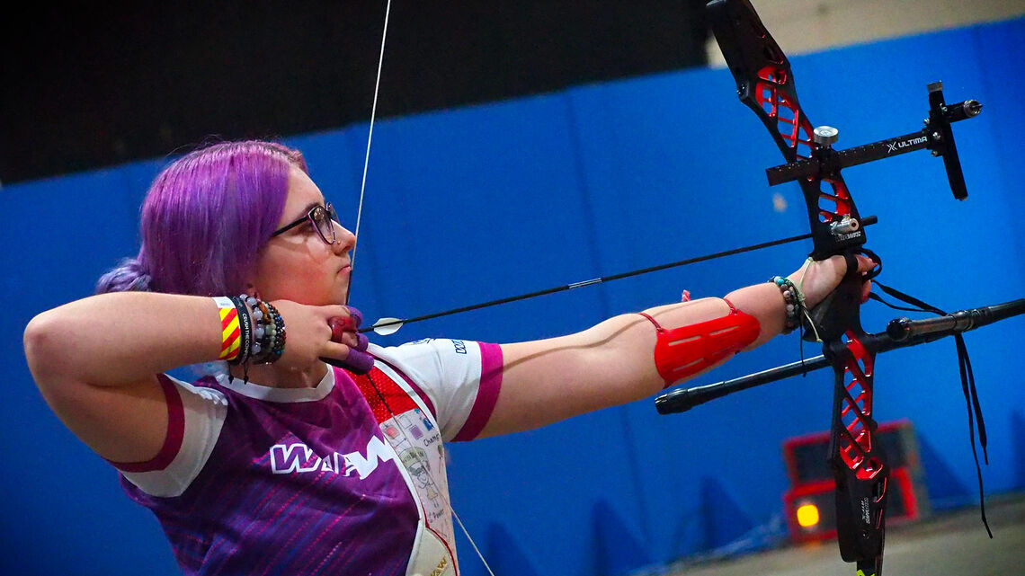 Penny Healey shoots at the British indoor championships in 2022.