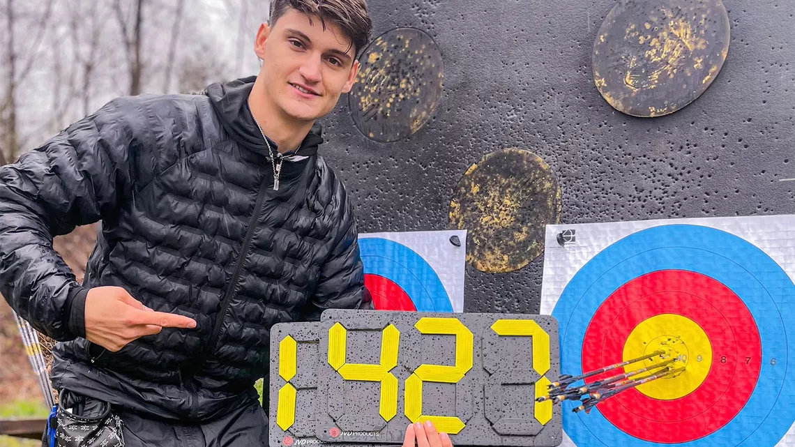 Tim Jevsnik poses with 1427 points on the board.