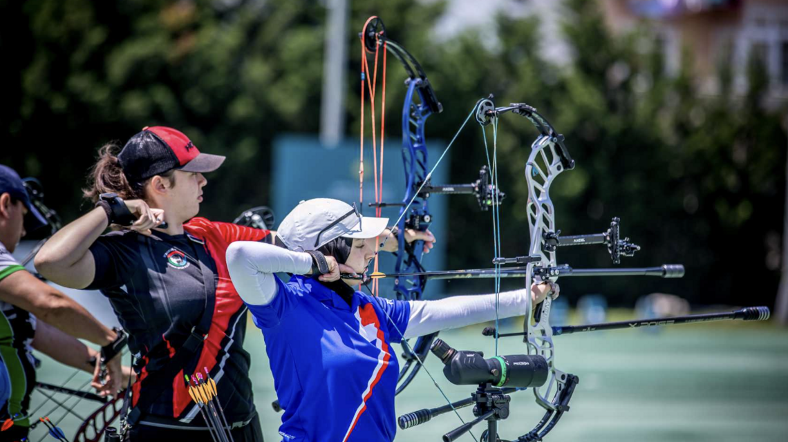 Defne Cakmak (left) aiming.