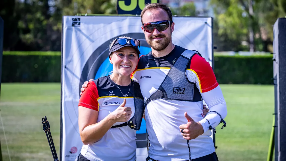 Katharina Bauer and Florian Unruh thumbs up at the target.