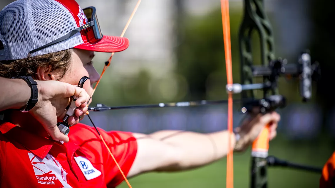 Mathias Fullerton aiming.
