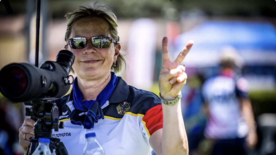 Natalia Valeeva pulling the 'peace' symbol with her fingers