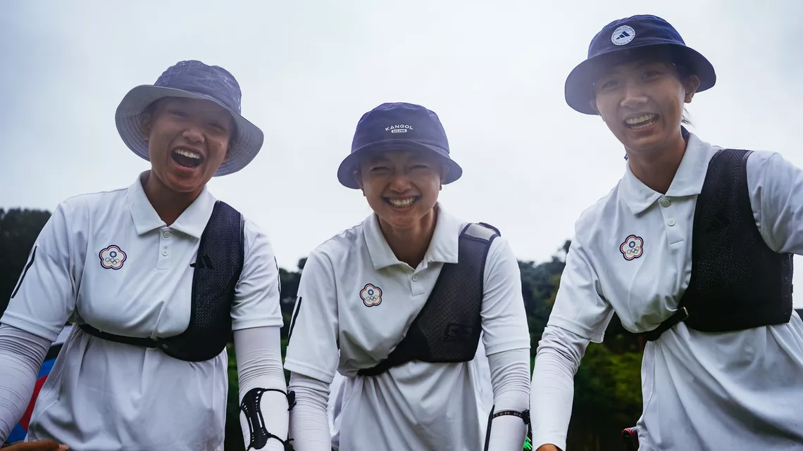 Chinese Taipei recurve women team celebrating.