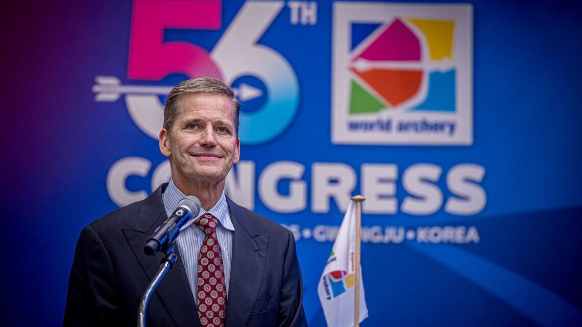 New president Greg Easton speaks to the 2025 World Archery Congress after his election.