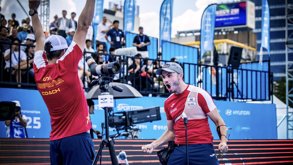 Andres Temino Mediel roaring with his coach after winning the World Championships.