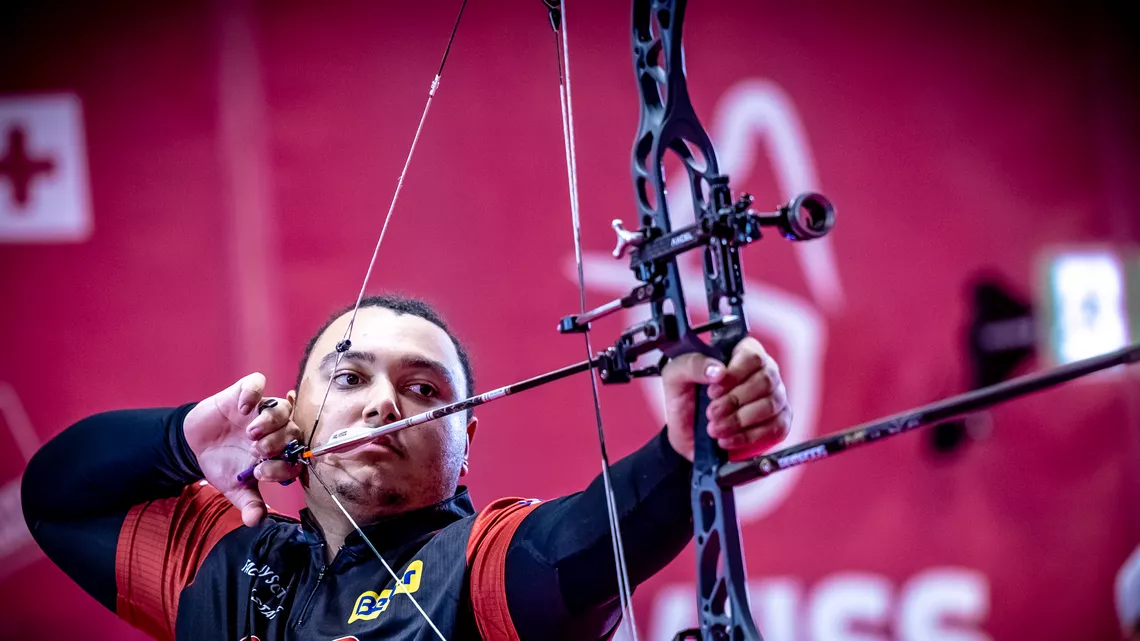 Ajay Scott aiming.
