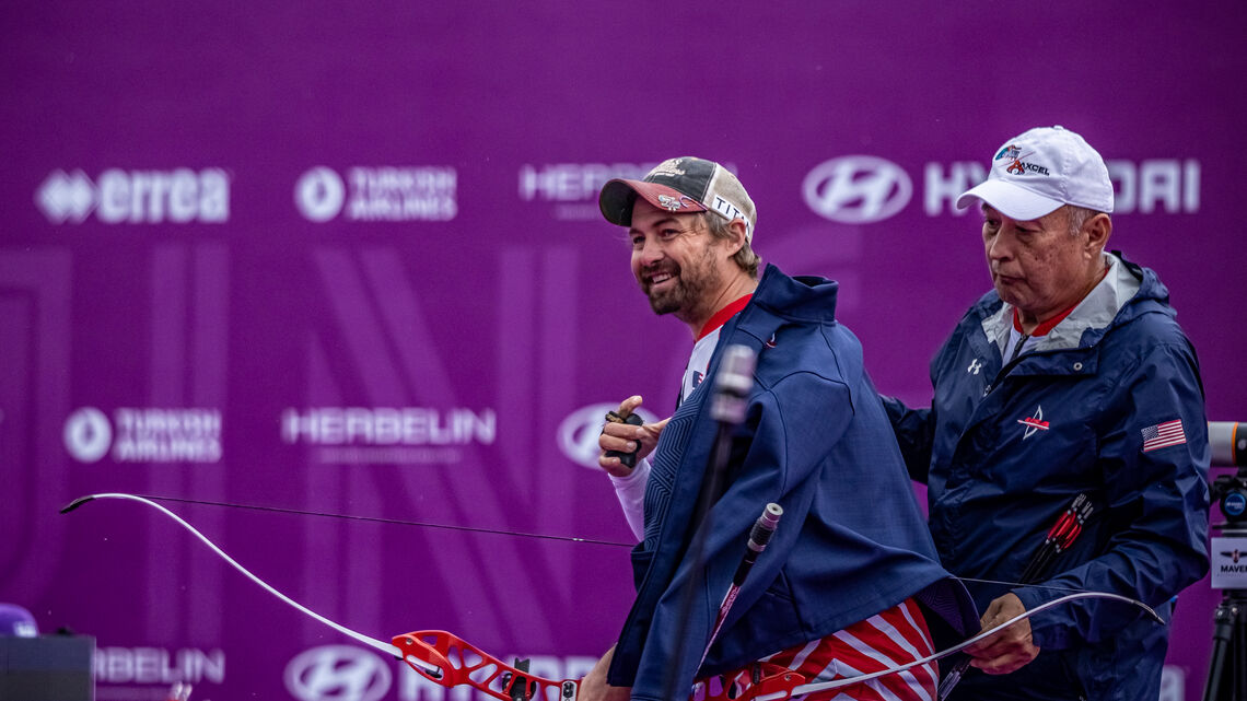 Brady Ellison smiling. 