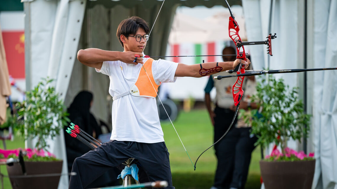An archer in action at the Dubai 2025 Asian Youth Para Games.