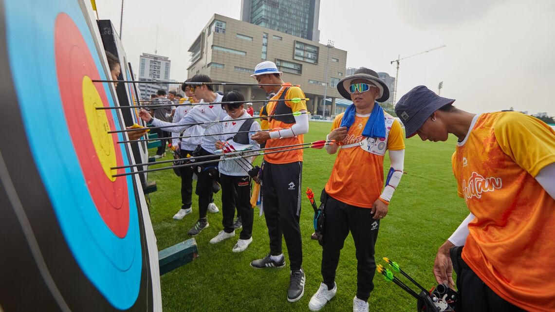 Competitors marking their scores at the Bangkok 2025 Asia Cup.