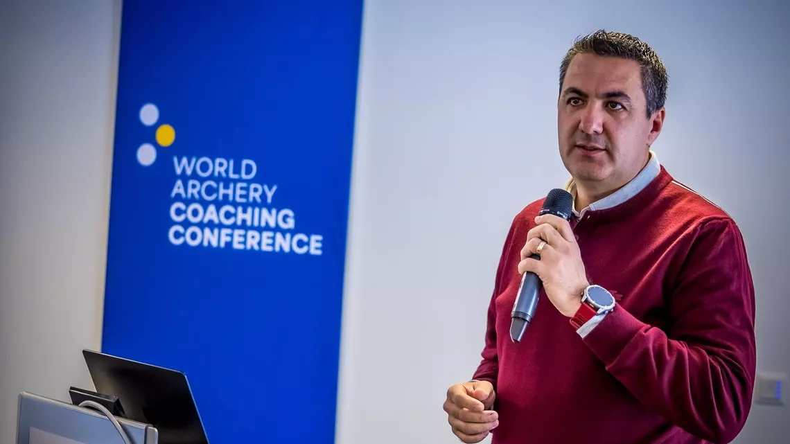 Goktug Ergin speaking at the World Archery Coaching Conference.