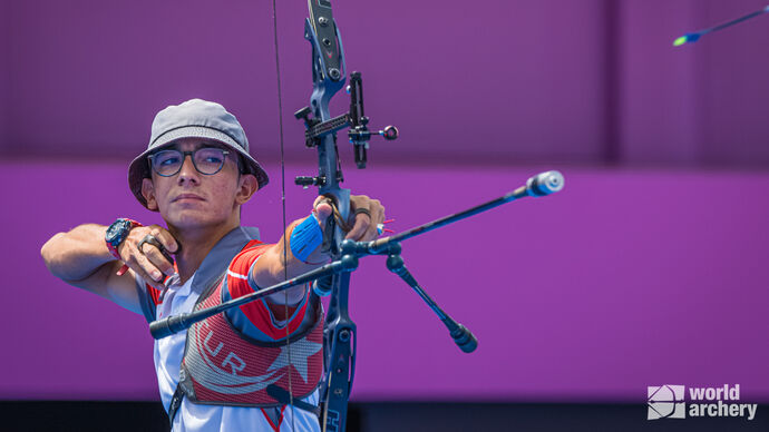 Mete Gazoz shoots at the Tokyo 2020 Olympic Games.