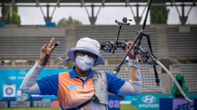 Deepika Kumari poses after winning the third stage of the 2021 Hyundai Archery World Cup in Paris.