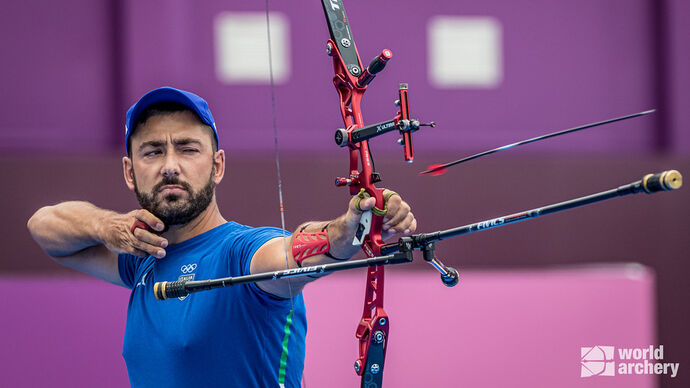 Mauro Nespoli shoots at the Tokyo 2020 Olympic Games. 