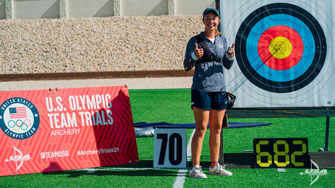 Casey Kaufhold poses with world record target during the US Olympic trials.