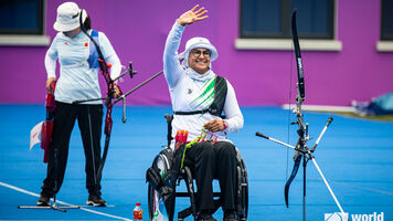 Zahra Nemati waving