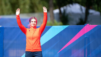 Healey climbs the podium at the 2023 European Games.