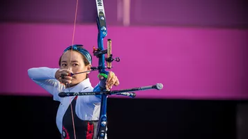 Karma shoots at the Tokyo 2020 Olympic Games.