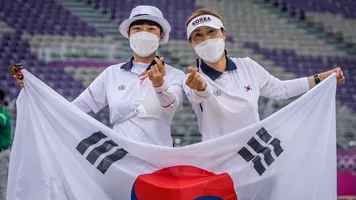An San celebrates individual gold at the Tokyo 2020 Olympic Games.