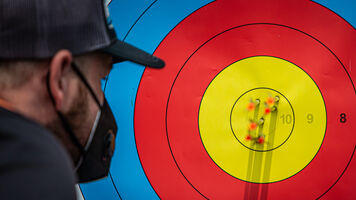 Mike Schloesser counts his points during qualification at the first stage of the 2021 Hyundai Archery World Cup in Guatemala City.